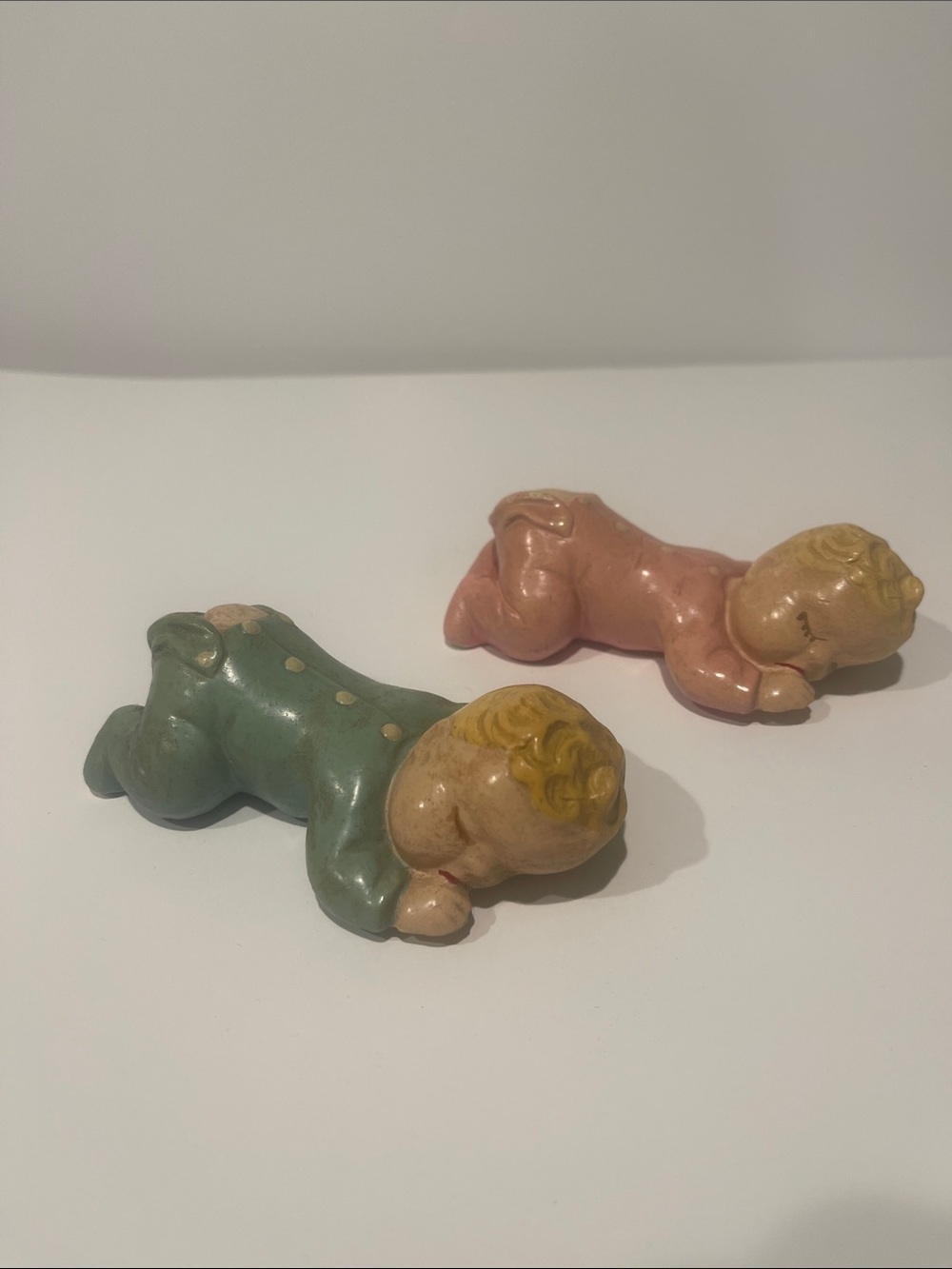 Set of vintage piano babies sleeping chalkware figurines